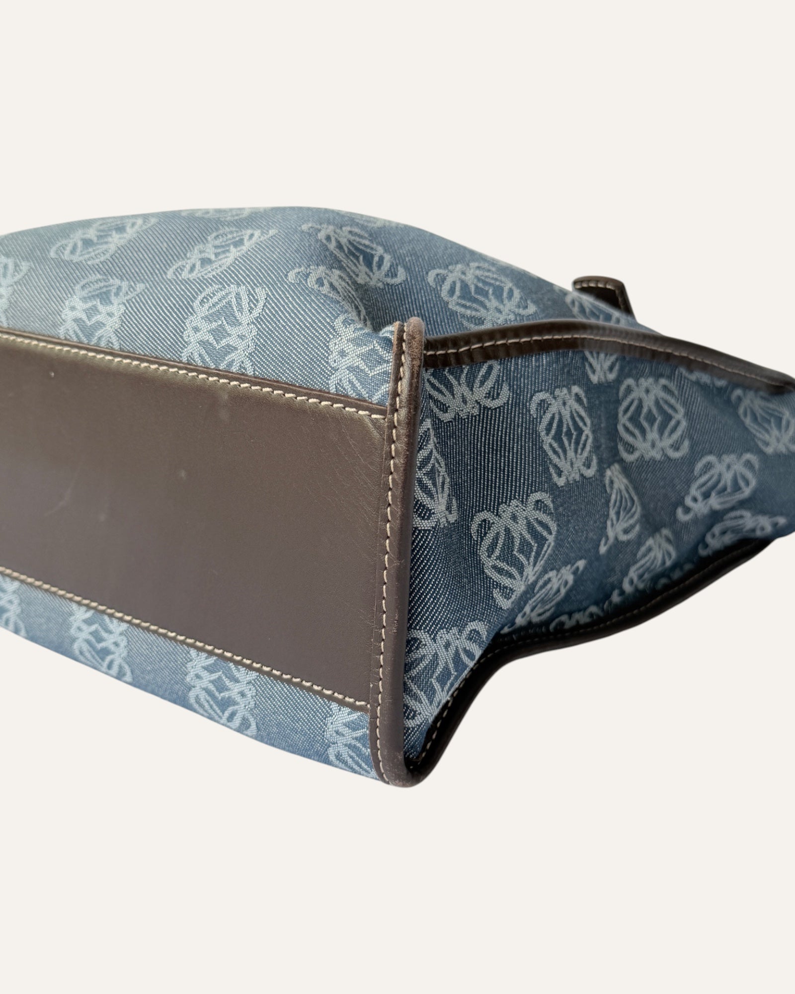 Loewe Anagram jacquard tote in denim blue canvas with brown leather trim and top handles