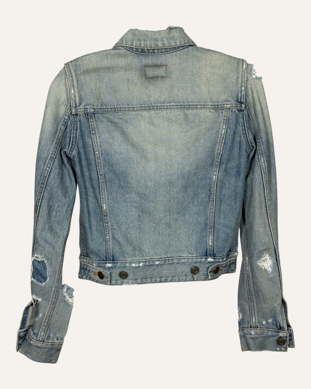 Saint Laurent light wash distressed denim fitted trucker jacket with ripped sleeves