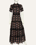 Carolina K black floral print tiered maxi dress with ruffled mockneck and lace trim