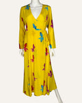 We Are Leone yellow silk wrap dress with blue, pink, and red fish print, long sleeves