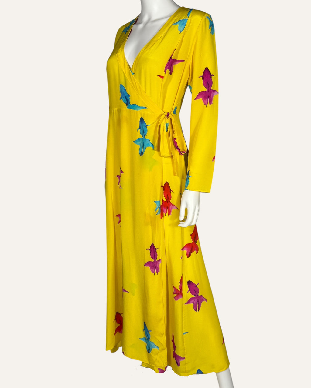 We Are Leone yellow silk wrap dress with blue, pink, and red fish print, long sleeves