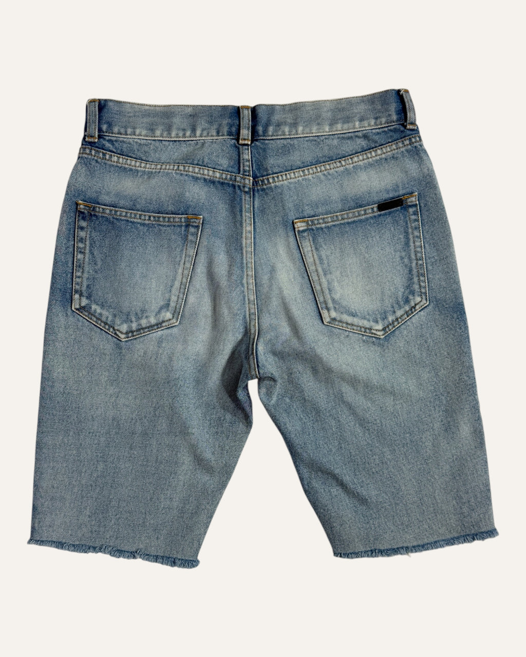 Saint Laurent mid-wash denim cutoff shorts with raw frayed hem