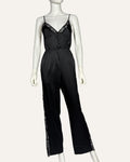 Fleur du Mal black silk jumpsuit with lace trim and wide-leg trousers