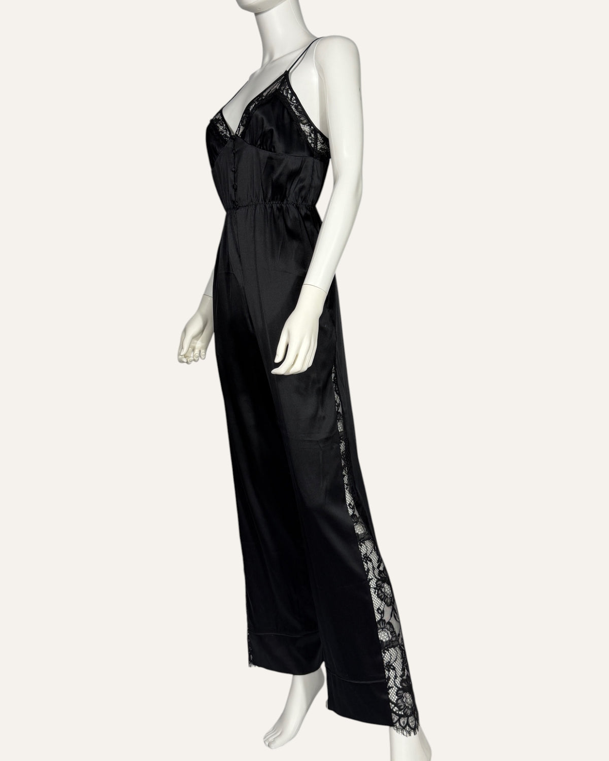 Fleur du Mal black silk jumpsuit with lace trim and wide-leg trousers