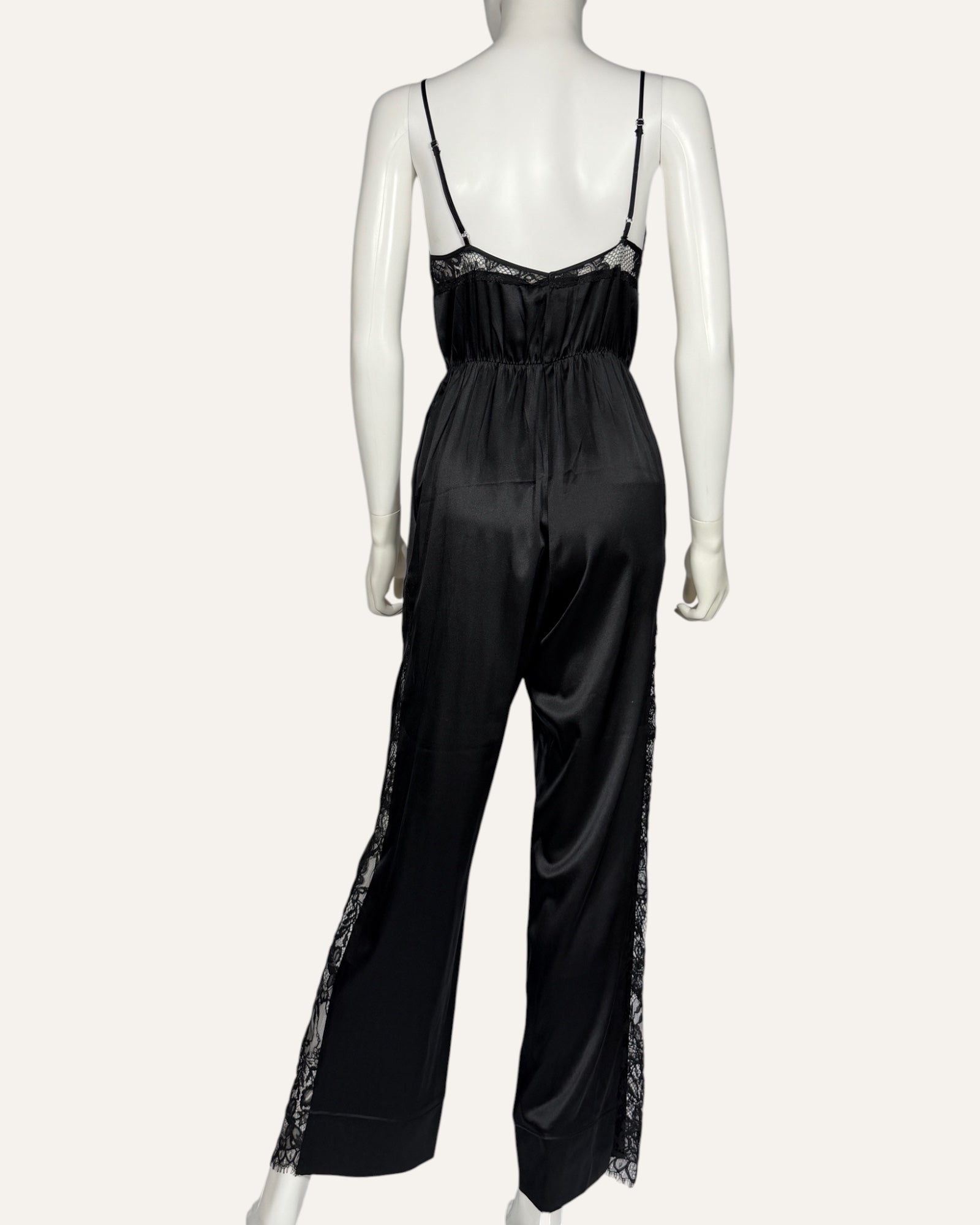 Fleur du Mal black silk jumpsuit with lace trim and wide-leg trousers
