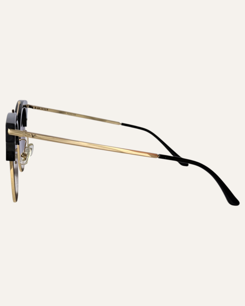 Gentle Monster Tell Me black and gold browline sunglasses