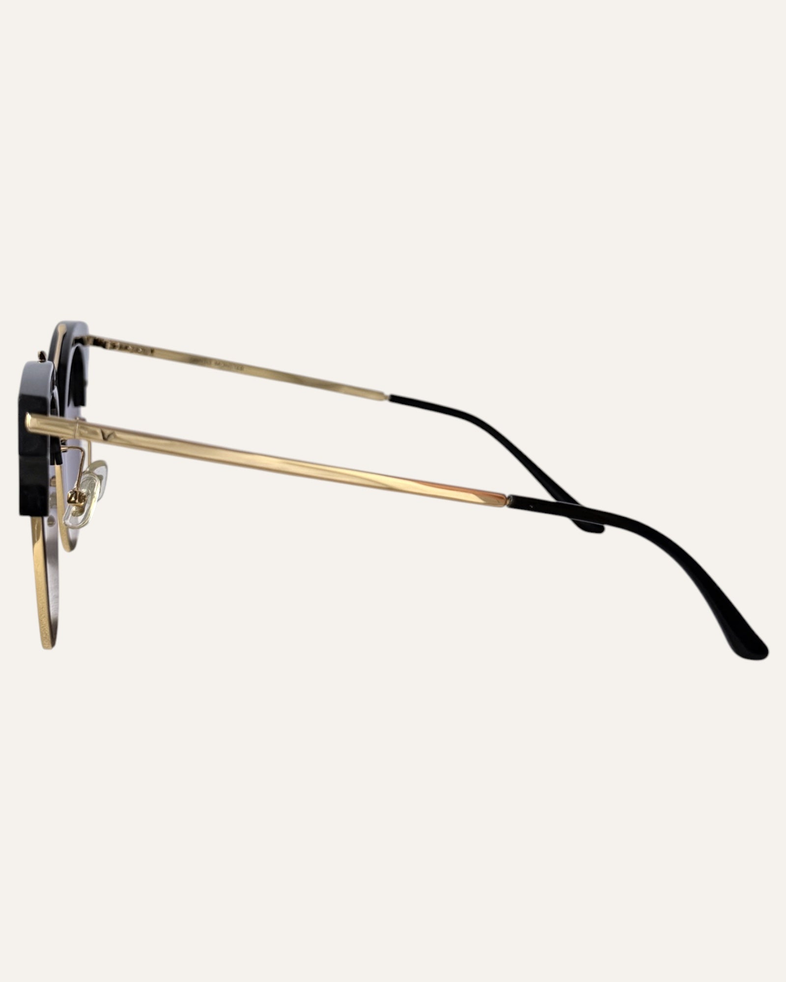 Gentle Monster Tell Me black and gold browline sunglasses