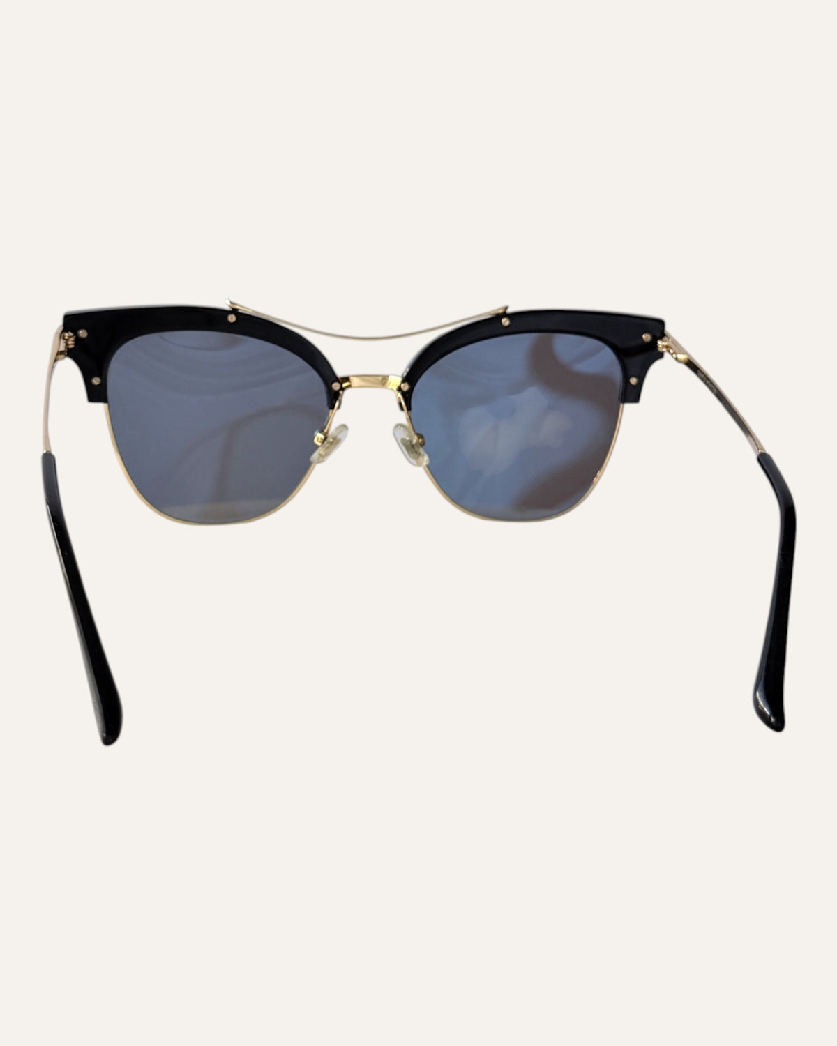 Gentle Monster Tell Me black and gold browline sunglasses
