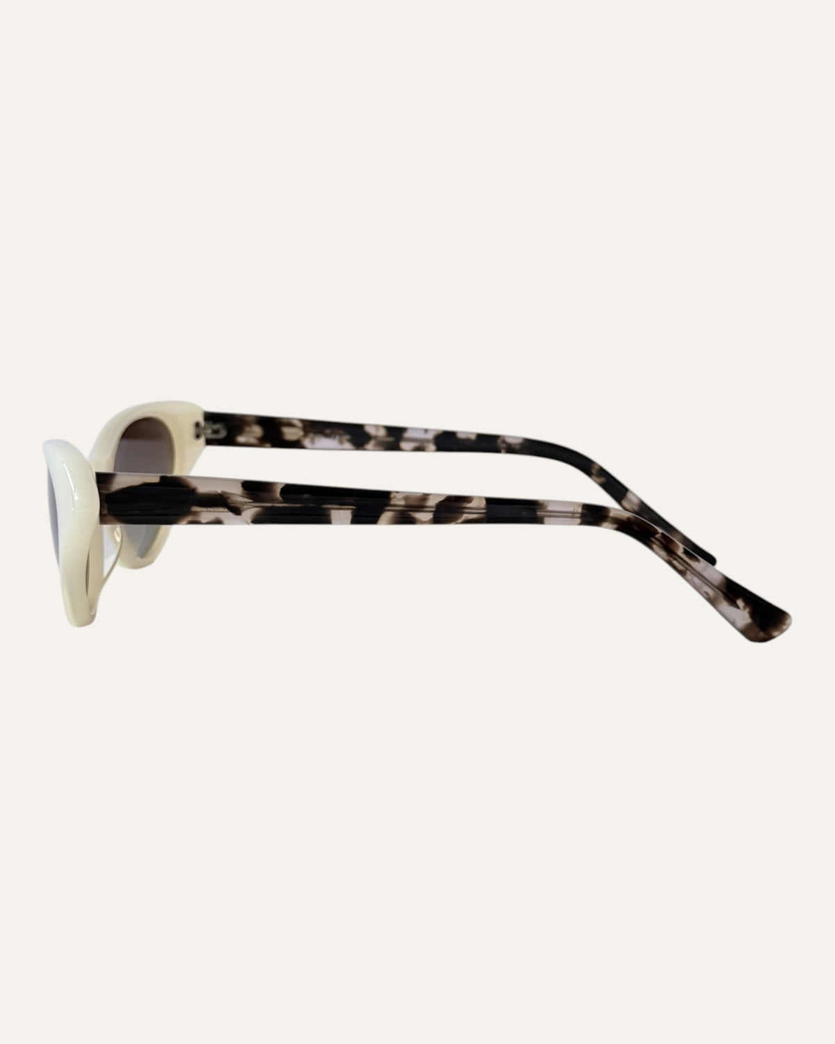 Shevoke Monroe milky ivory cat-eye sunglasses with gradient brown lenses