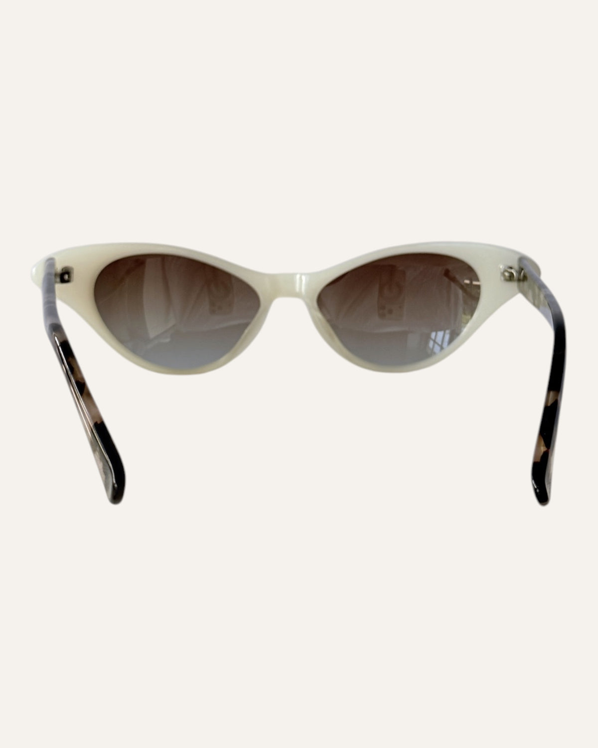 Shevoke Monroe milky ivory cat-eye sunglasses with gradient brown lenses