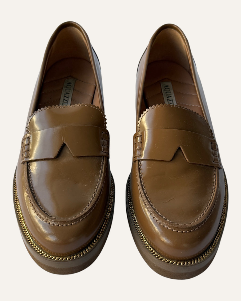 Aquazzura brown leather penny loafers with gold-tone welt trim