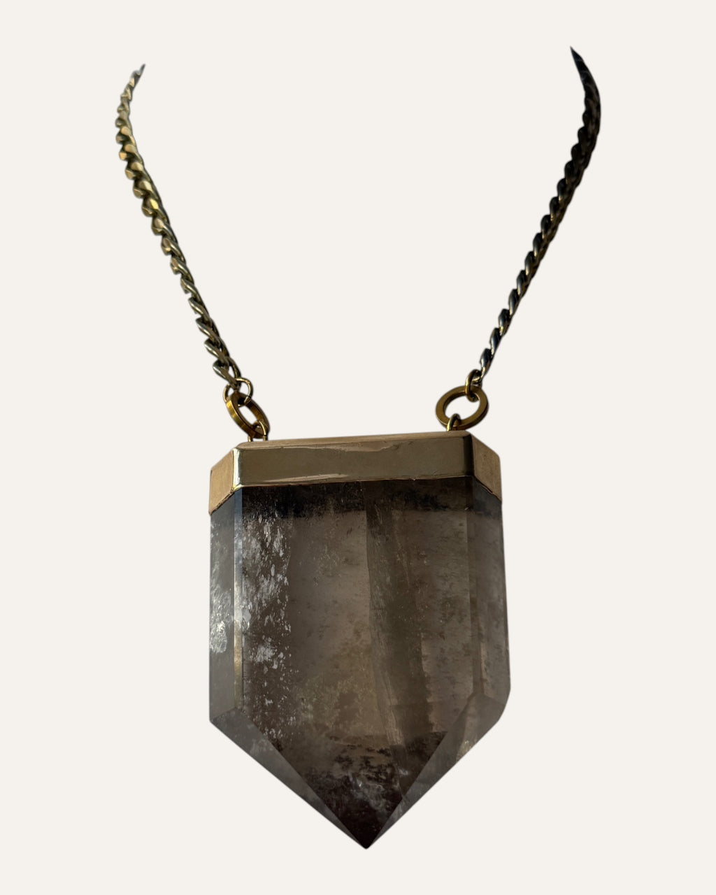 Oversized faceted smoky pendant necklace with gold-tone setting and curb chain