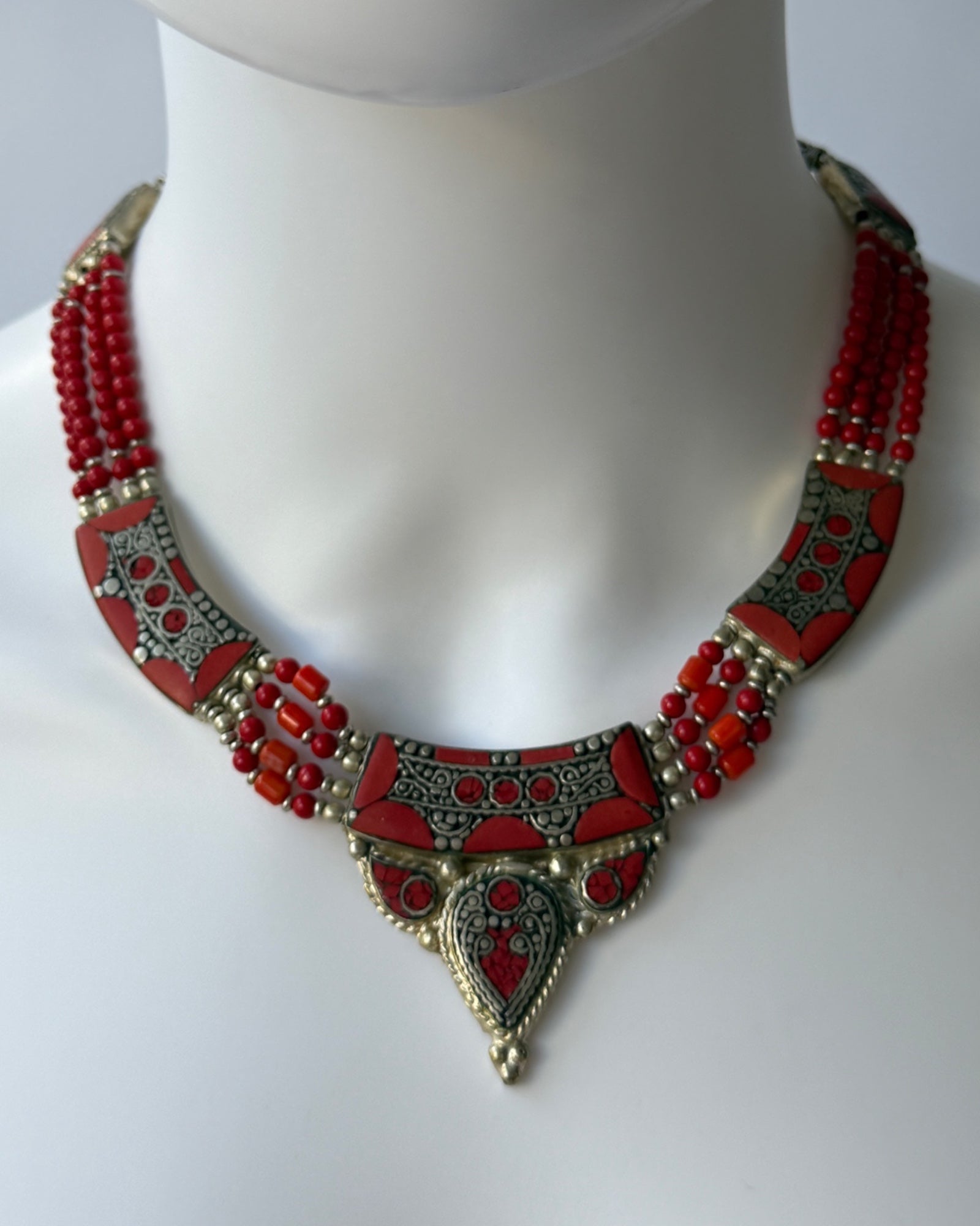 Tibetan-style silver and coral inlay statement necklace with multi-strand beading