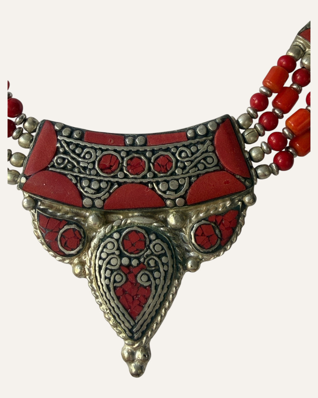 Tibetan-style silver and coral inlay statement necklace with multi-strand beading
