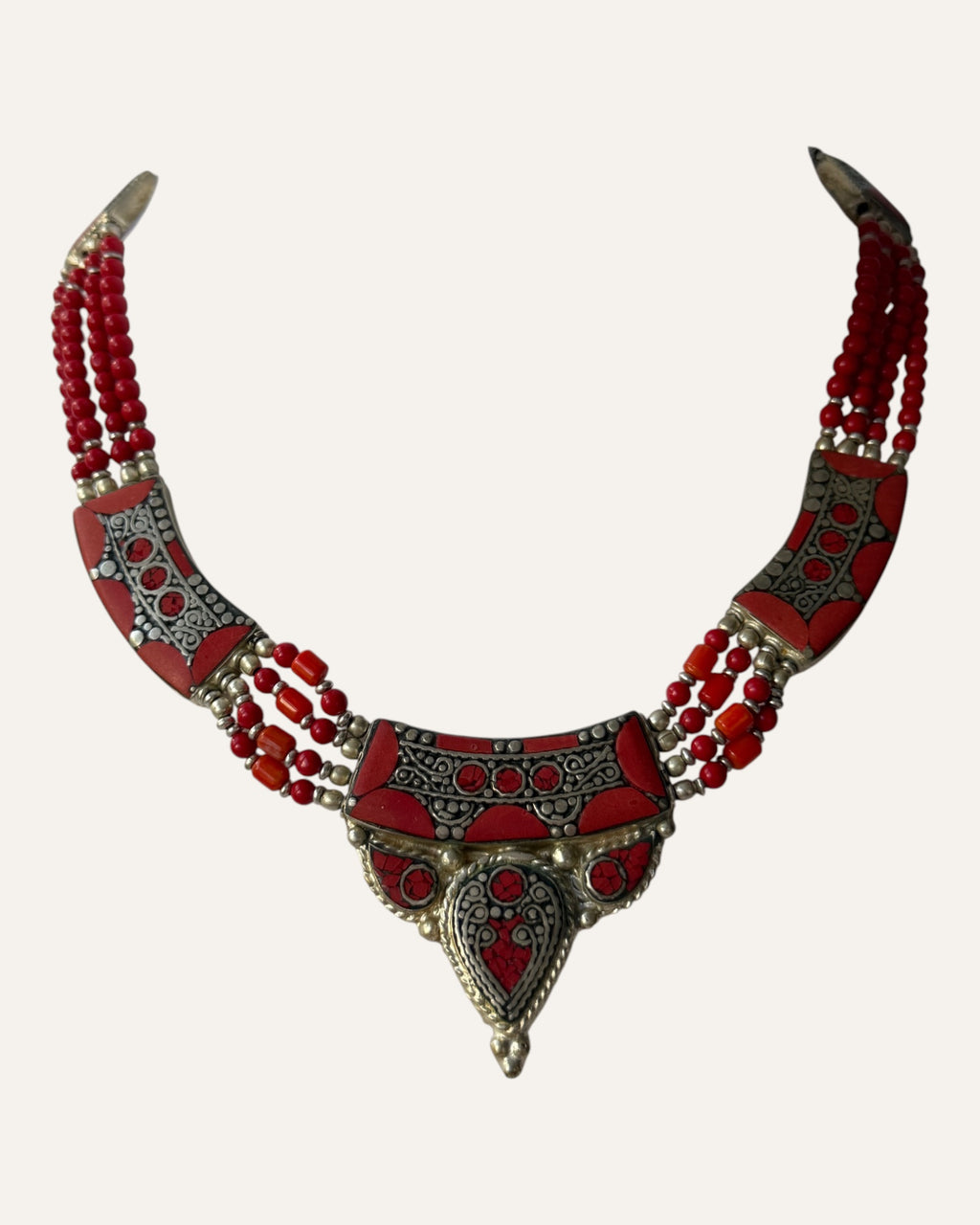 Tibetan-style silver and coral inlay statement necklace with multi-strand beading