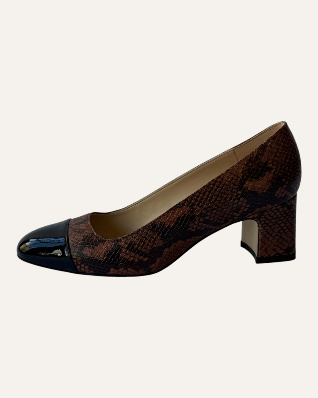 Stuart Weitzman brown snake-embossed leather pumps with black patent cap toes