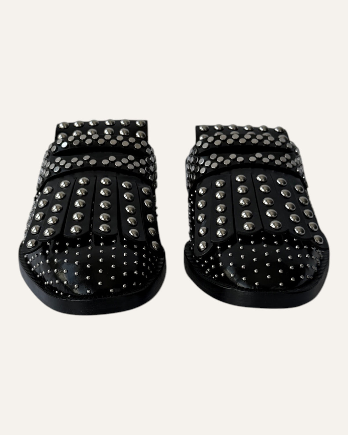 Clergerie Paris Youla black leather backless loafers with silver-tone studs and layered kiltie fringe