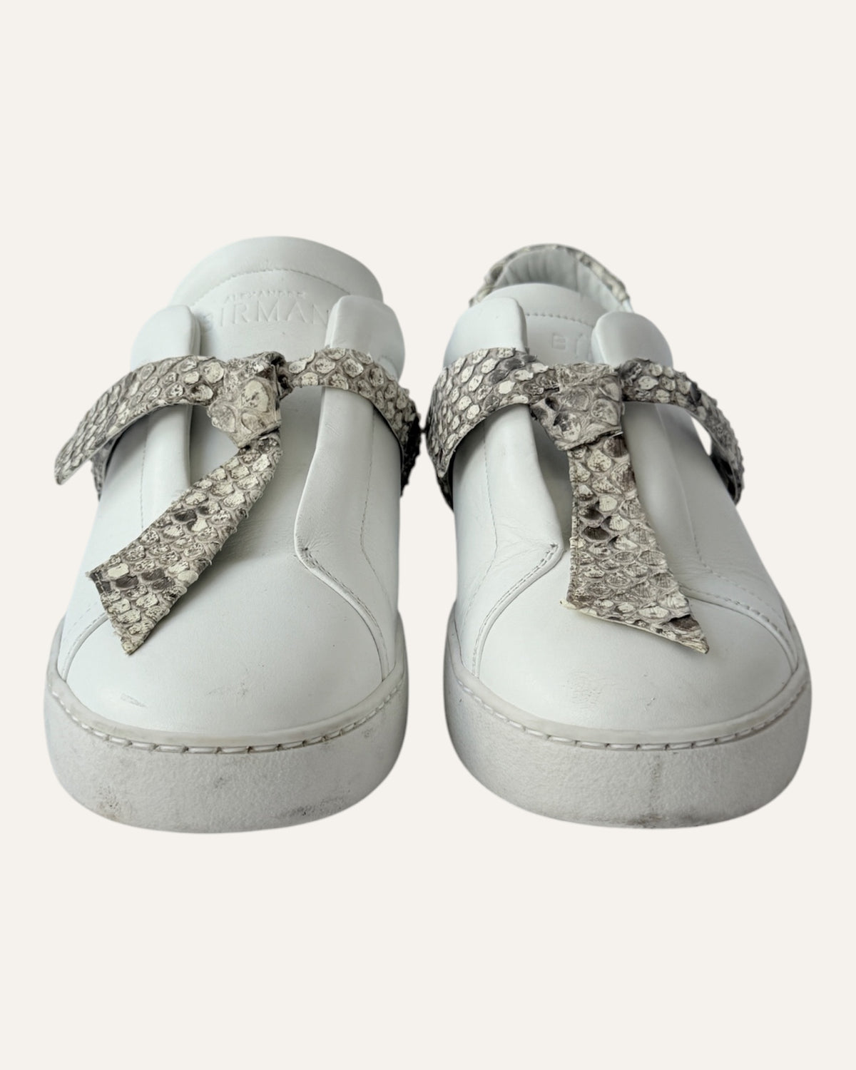 Alexandre Birman white leather slip-on sneakers with knotted jungle snake bow strap
