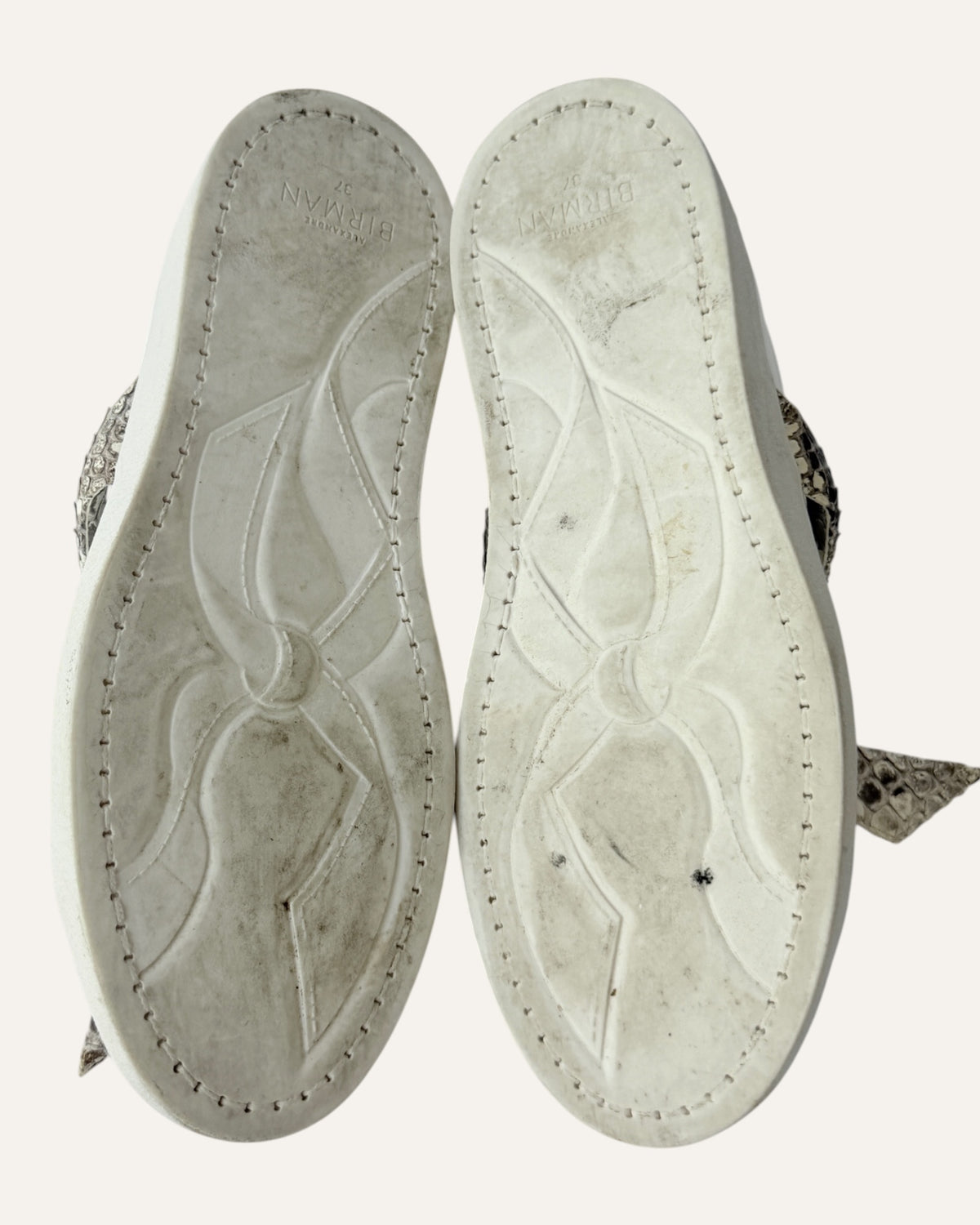 Alexandre Birman white leather slip-on sneakers with knotted jungle snake bow strap
