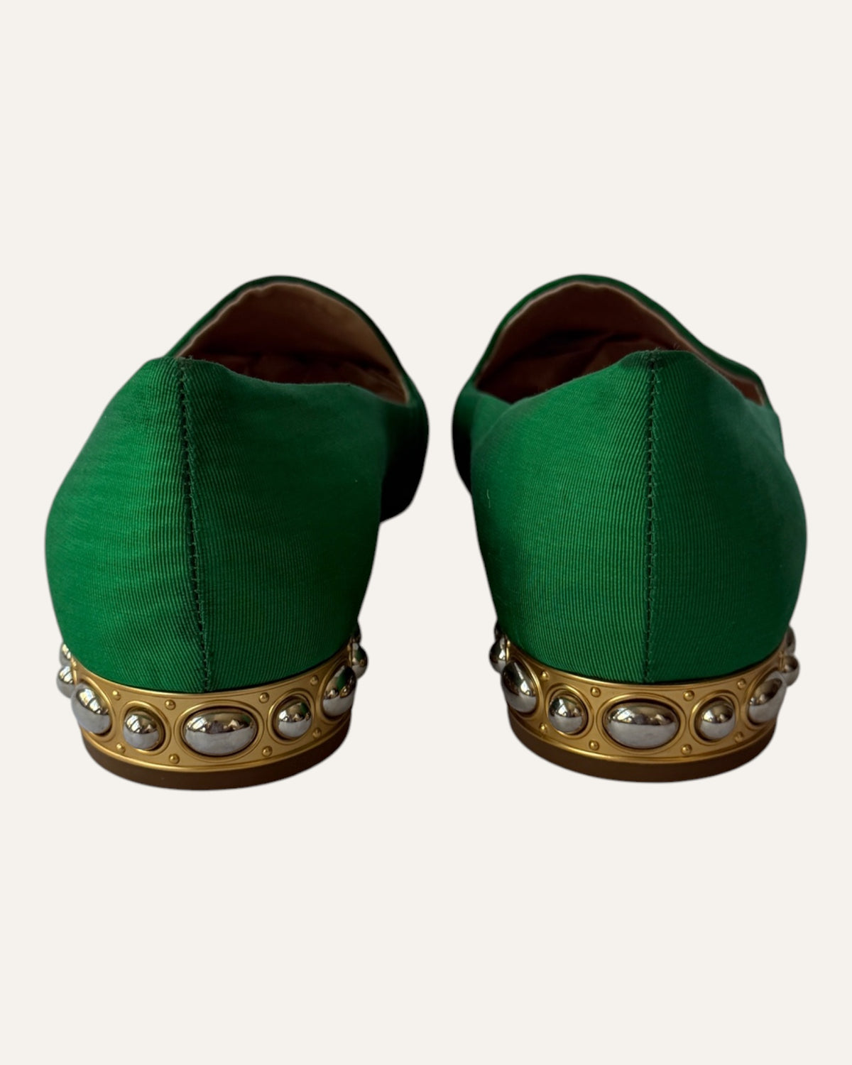 Aquazzura green loafers with metallic gold embroidered sun face and beaded details on the toes