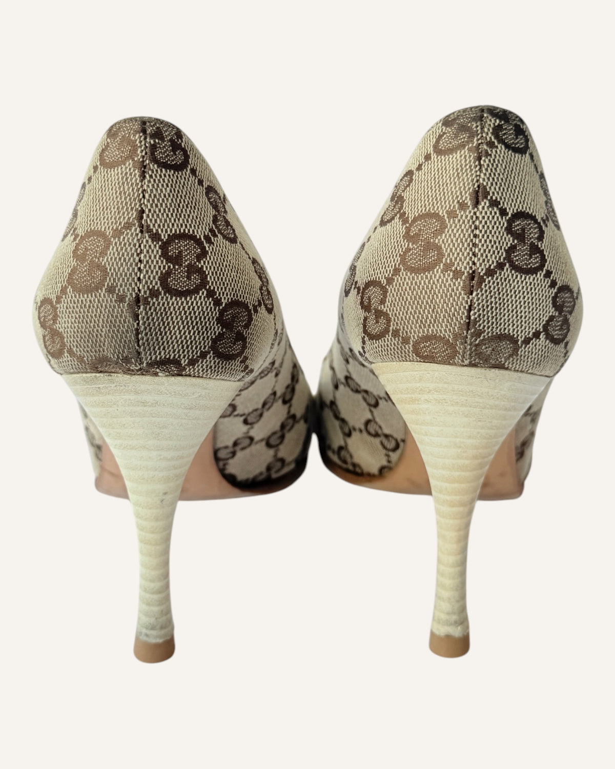 Vintage 2005 Gucci beige GG monogram canvas pointed-toe pumps with ivory leather strap, gold chain and logo charm, size 7.5