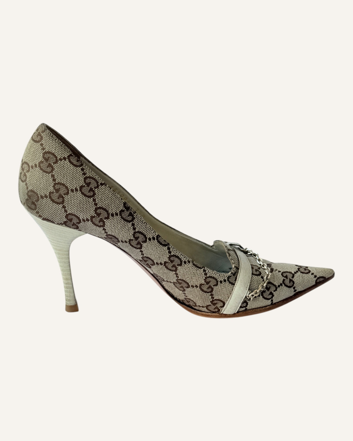 Vintage 2005 Gucci beige GG monogram canvas pointed-toe pumps with ivory leather strap, gold chain and logo charm, size 7.5