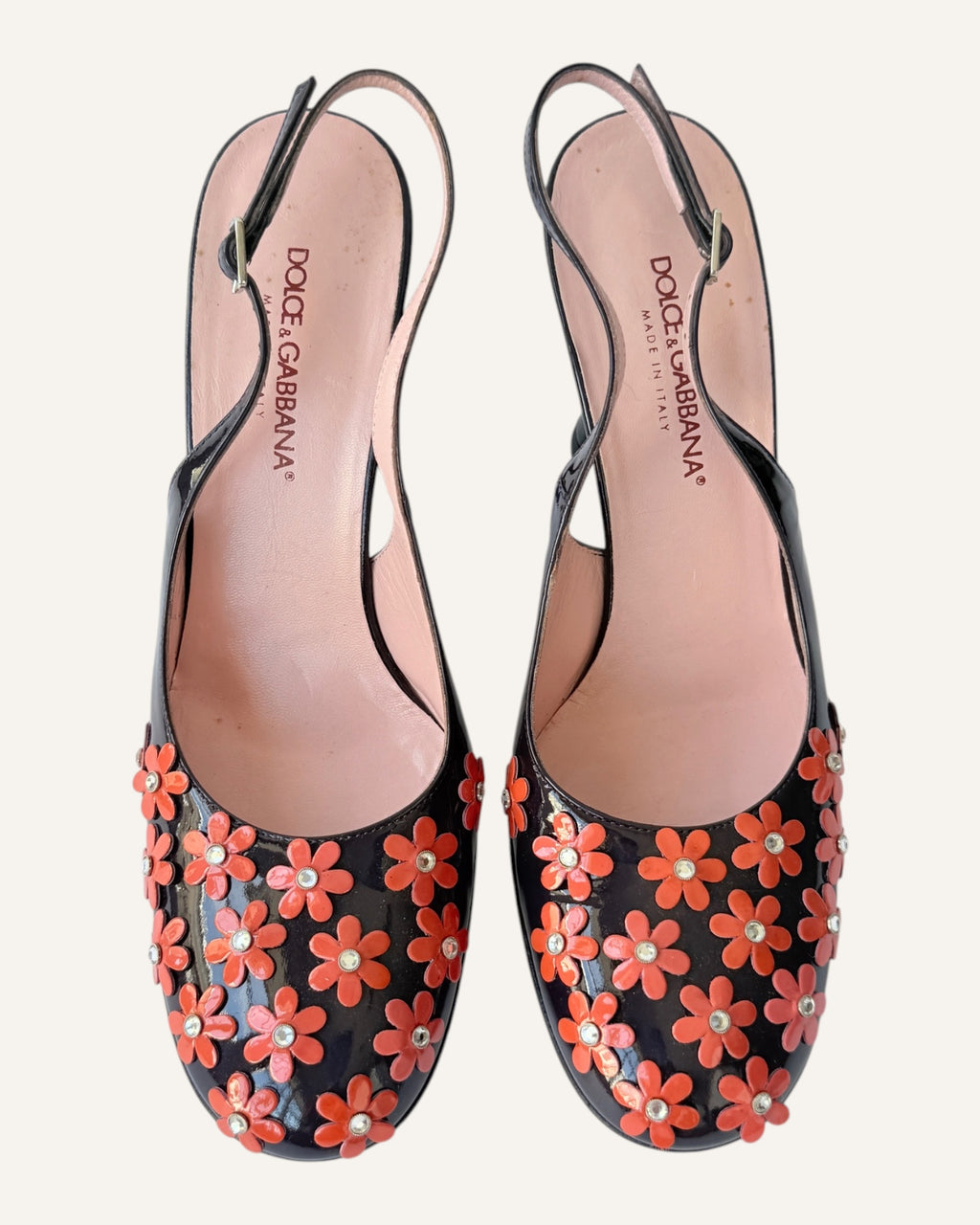 Dolce & Gabbana black patent leather slingback heels with coral floral appliqués and rhinestone centers, size 35.5