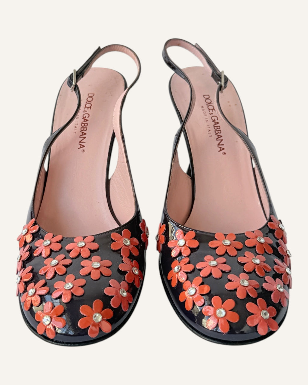 Dolce & Gabbana black patent leather slingback heels with coral floral appliqués and rhinestone centers, size 35.5