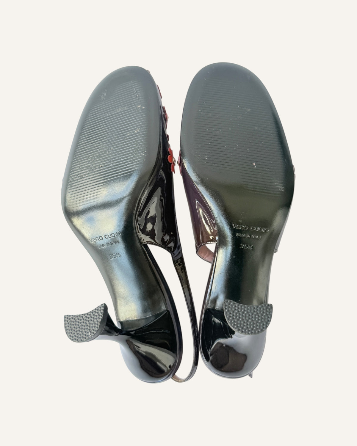 Dolce & Gabbana black patent leather slingback heels with coral floral appliqués and rhinestone centers, size 35.5