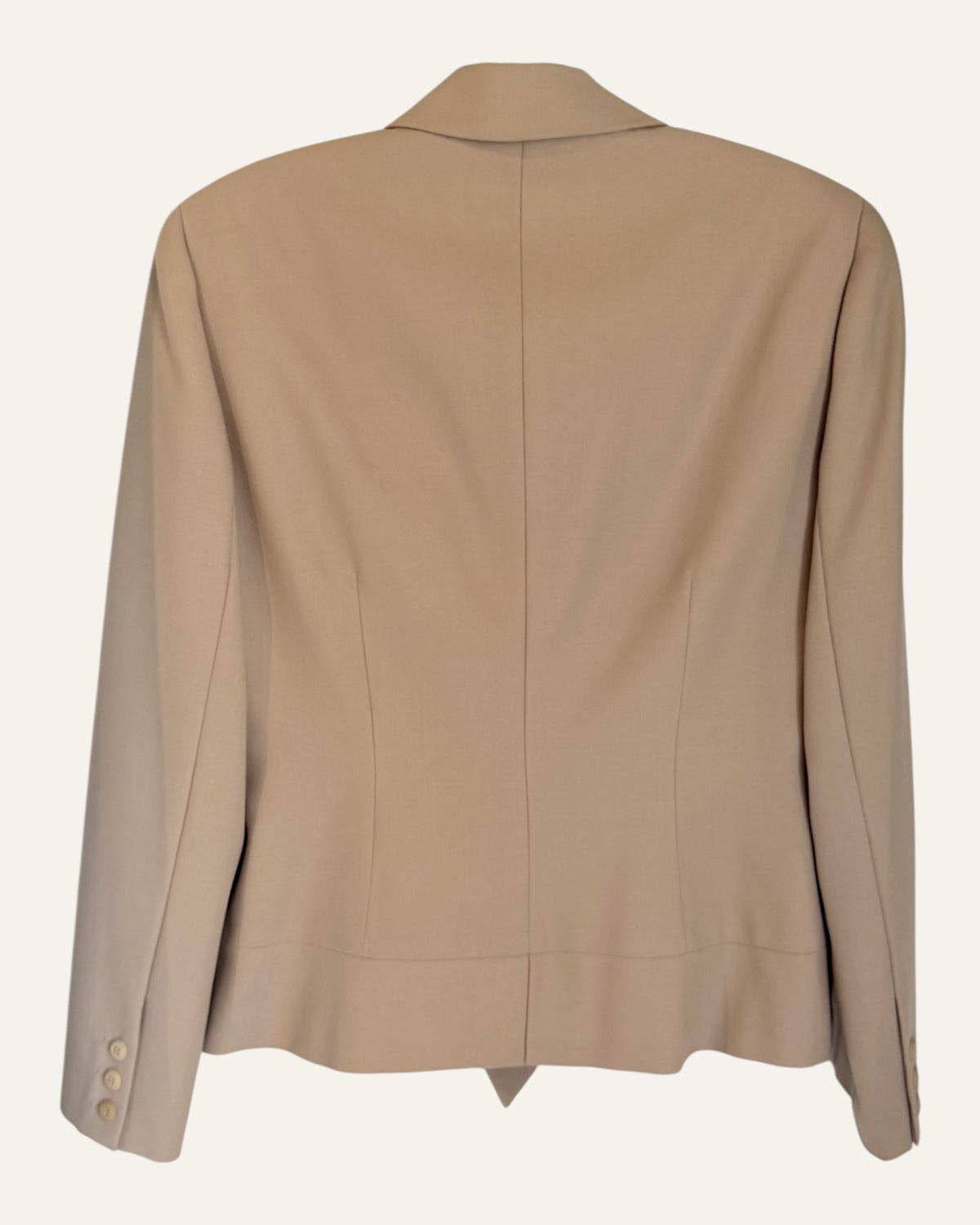 Oscar by Oscar de la Renta camel wool double-breasted blazer and pleated cuffed trousers with Neiman Marcus tags on cream background