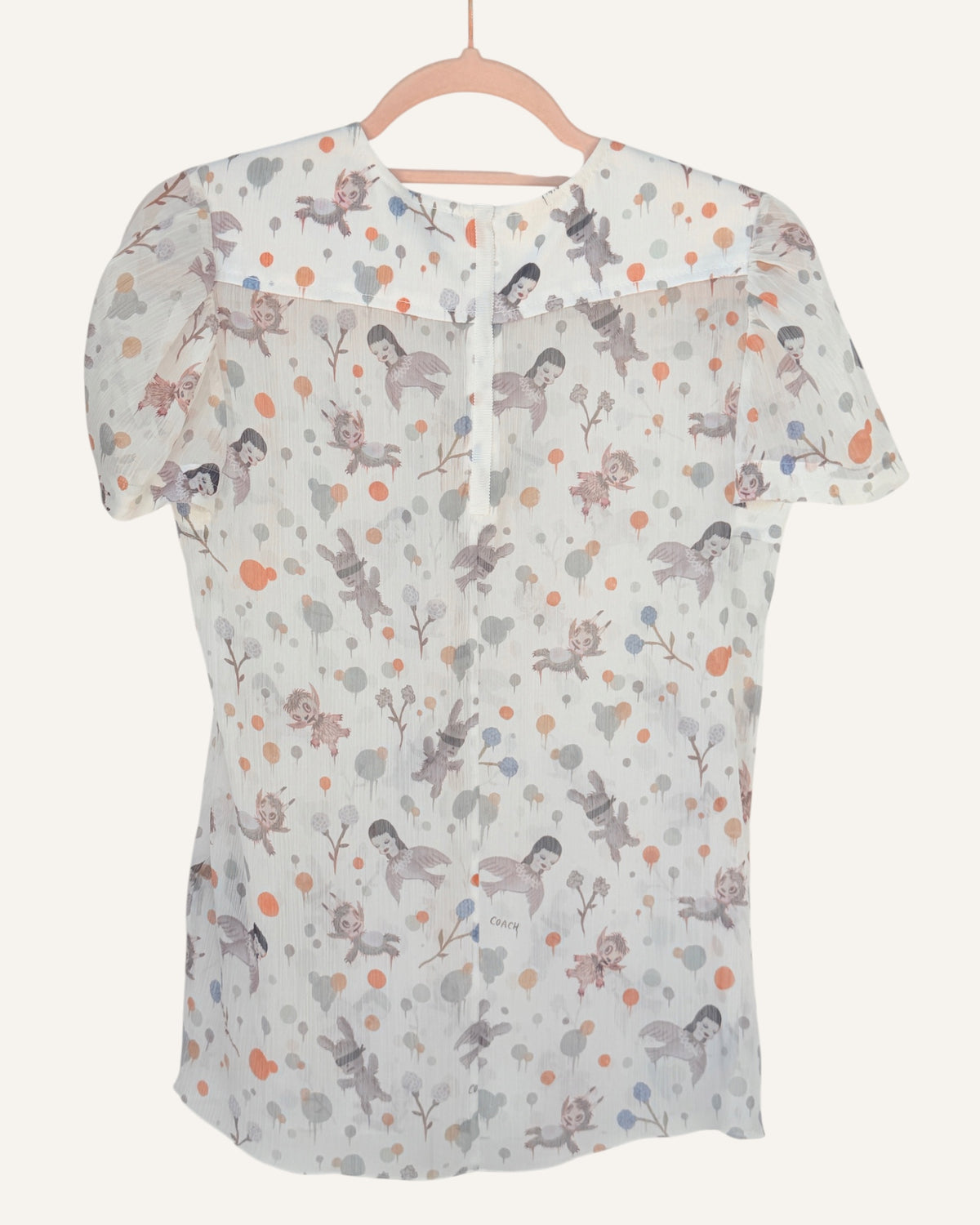 Coach x Gary Baseman ivory sheer blouse with allover whimsical character and floral print
