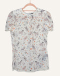 Coach x Gary Baseman ivory sheer blouse with allover whimsical character and floral print