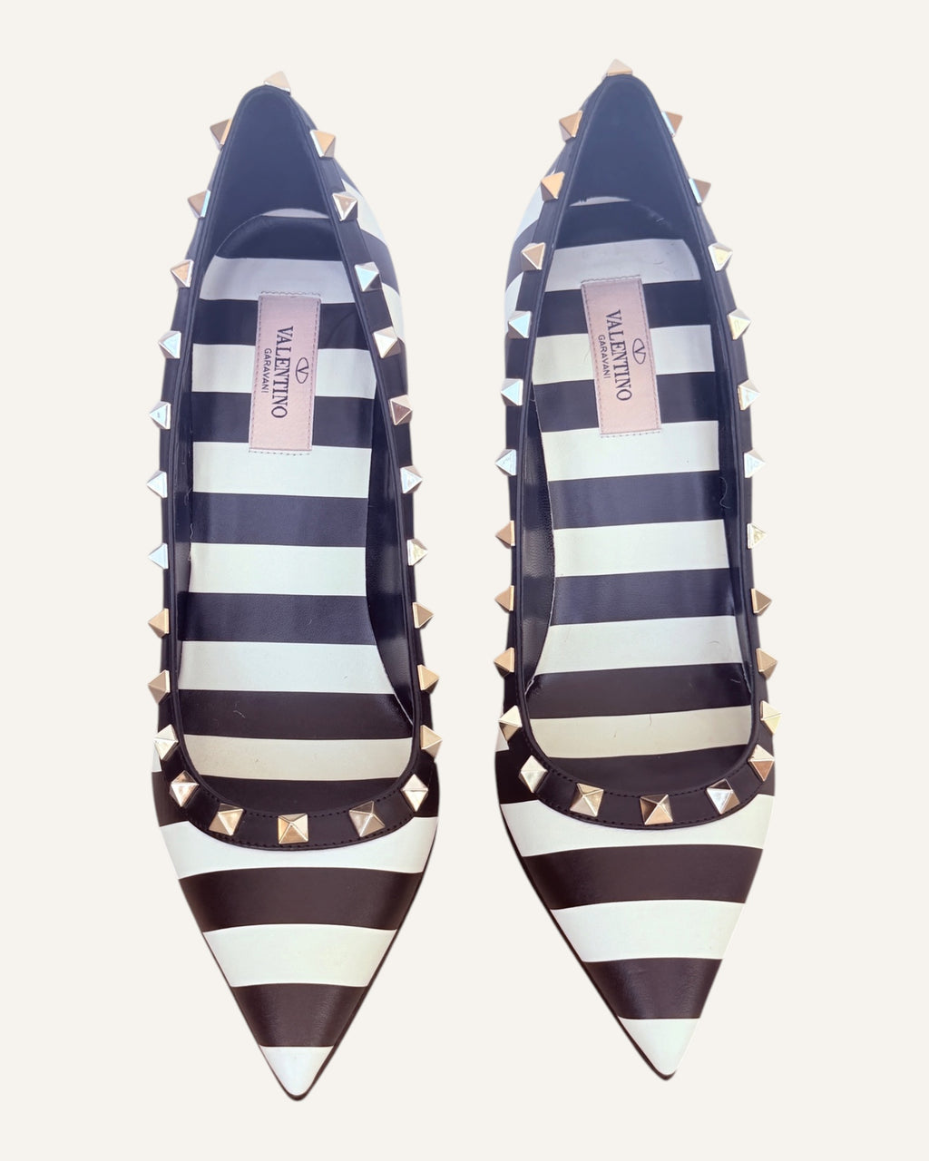 Valentino Garavani black and ivory striped leather Rockstud pumps with pyramid studs and stiletto heel, size 39