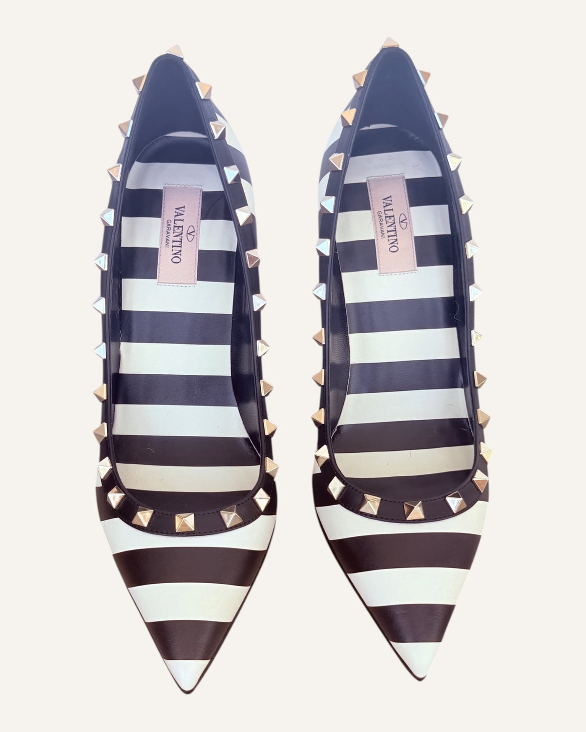 Valentino Garavani black and ivory striped leather Rockstud pumps with pyramid studs and stiletto heel, size 39