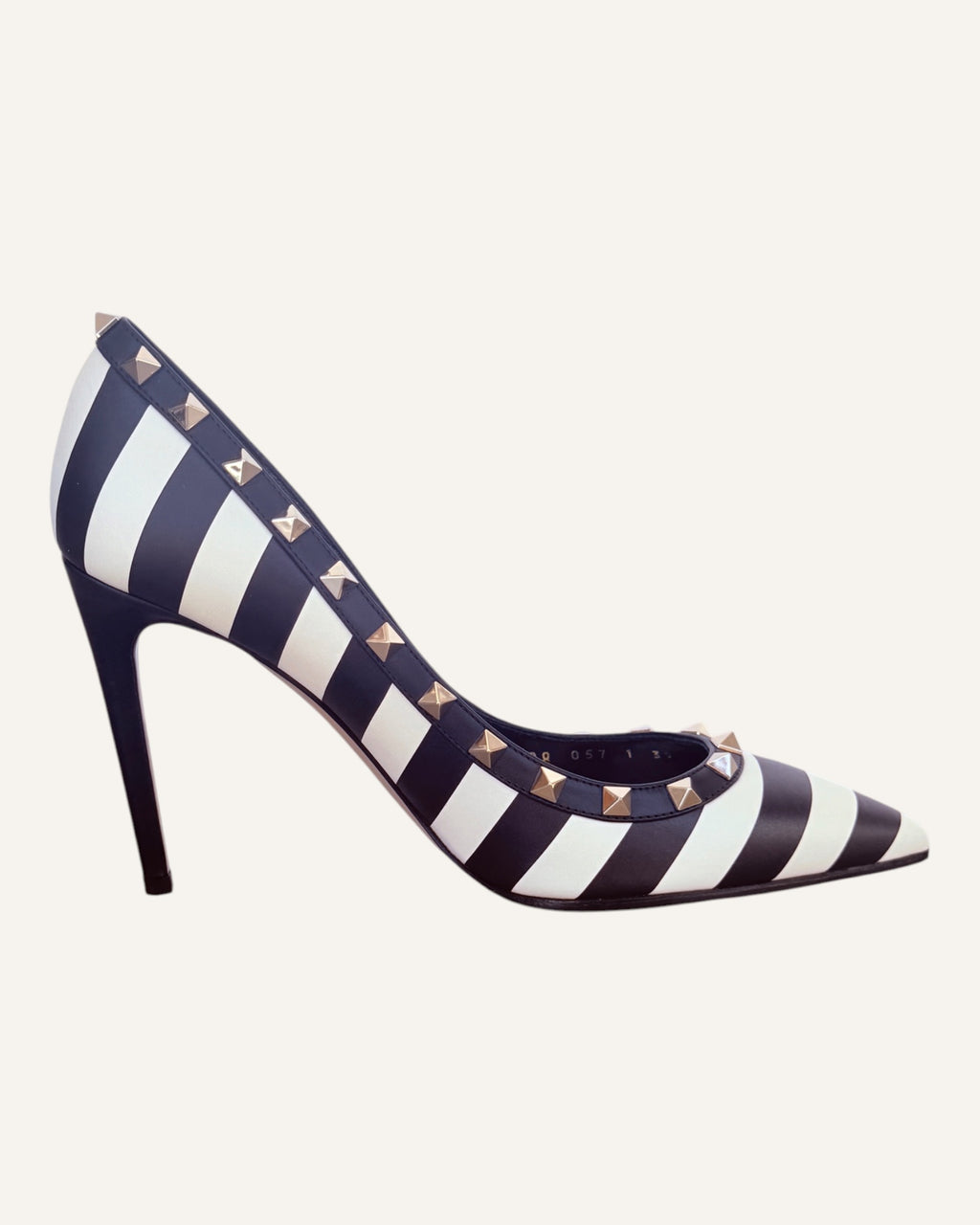 Valentino Garavani black and ivory striped leather Rockstud pumps with pyramid studs and stiletto heel, size 39