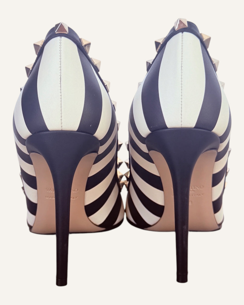 Valentino Garavani black and ivory striped leather Rockstud pumps with pyramid studs and stiletto heel, size 39