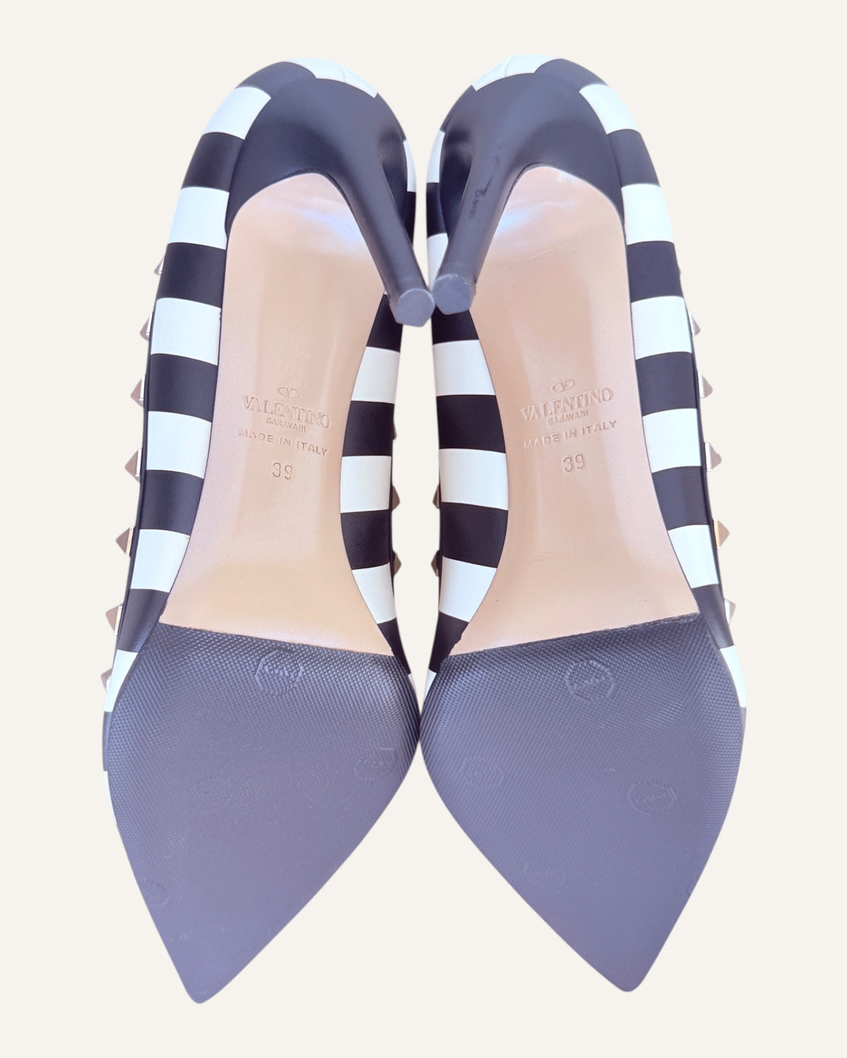 Valentino Garavani black and ivory striped leather Rockstud pumps with pyramid studs and stiletto heel, size 39