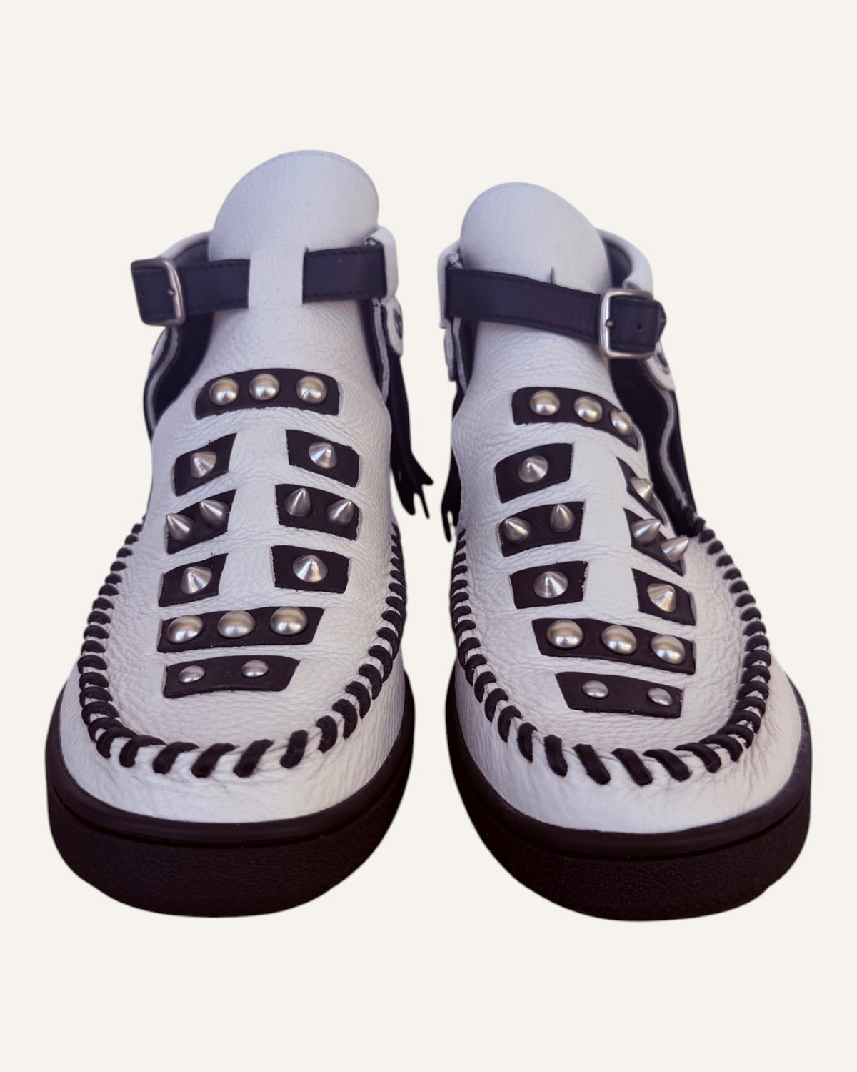 Coach 1941 Roccasin white leather studded fringe cutout booties with whipstitched moc toe and buckled ankle strap, pre-loved designer shoes