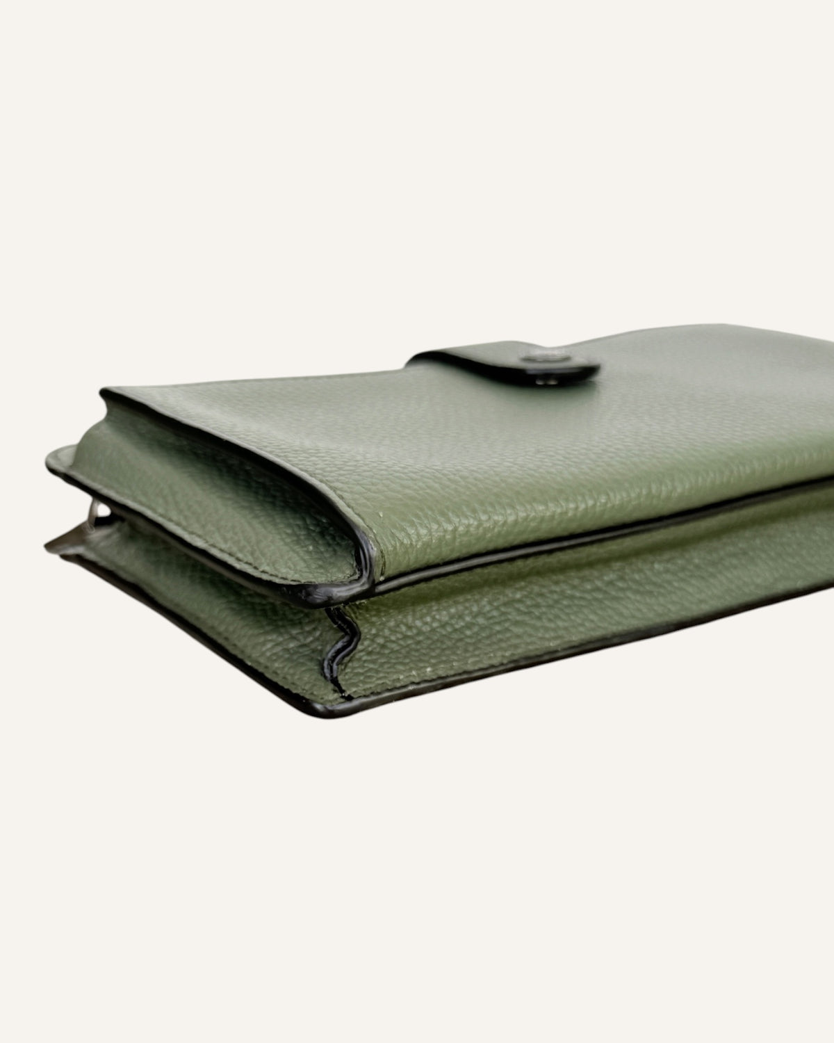 Coach sage green pebbled leather crossbody wallet with snap-tab pocket, silver hardware and detachable strap