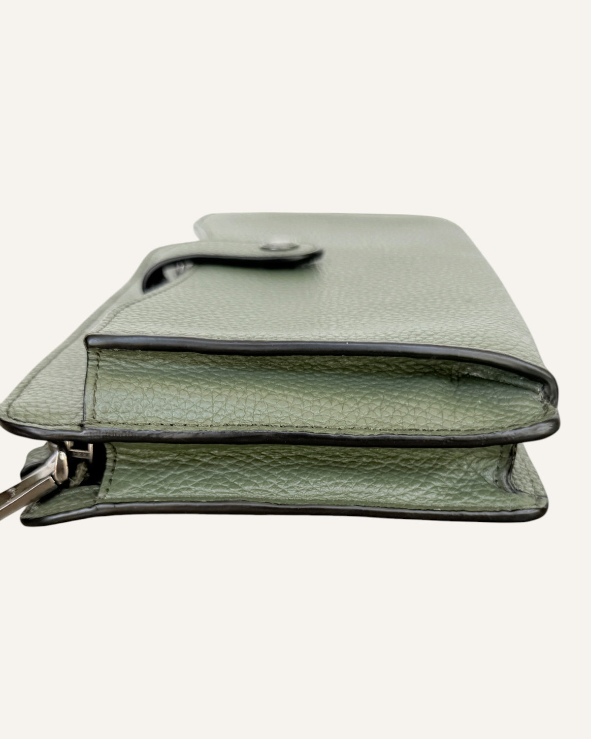 Coach sage green pebbled leather crossbody wallet with snap-tab pocket, silver hardware and detachable strap