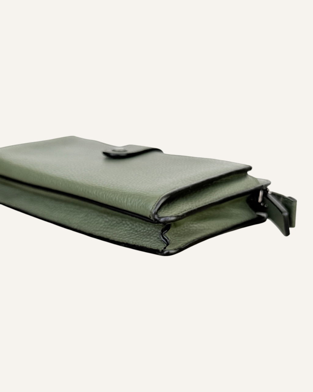 Coach sage green pebbled leather crossbody wallet with snap-tab pocket, silver hardware and detachable strap