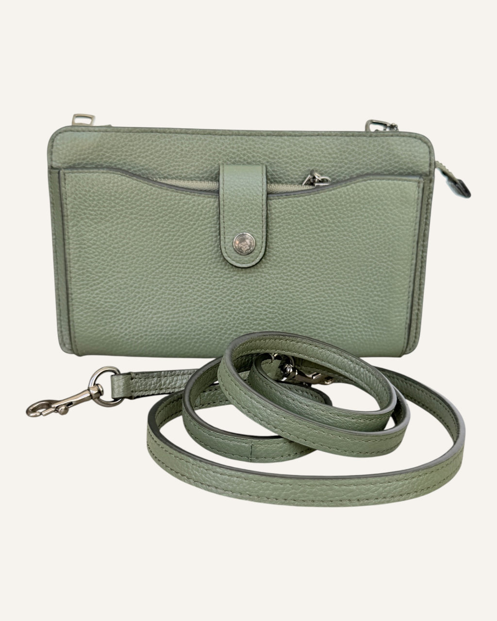 Coach sage green pebbled leather crossbody wallet with snap-tab pocket, silver hardware and detachable strap