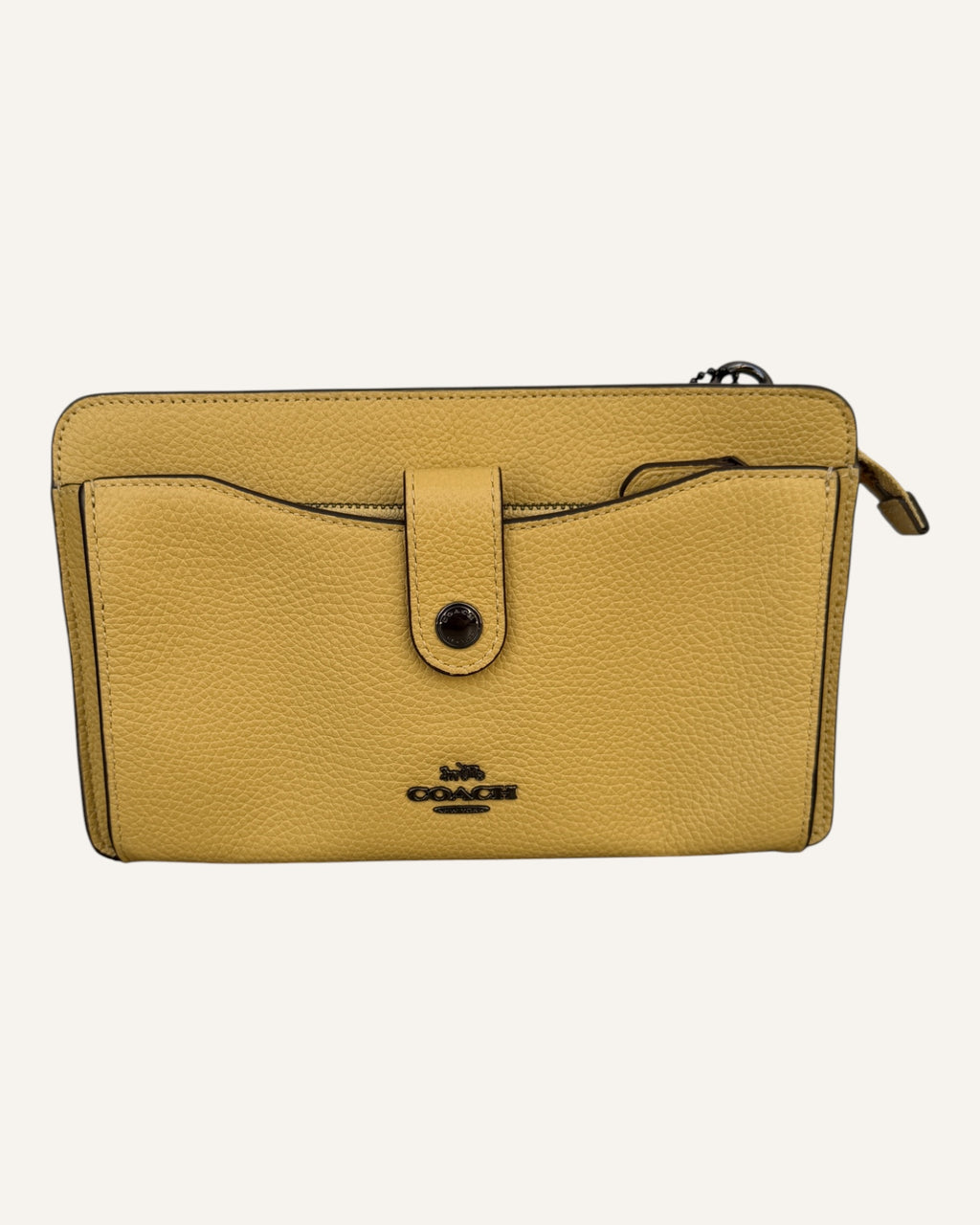 Coach mustard yellow pebbled leather wristlet wallet with snap-tab slip pocket and silver hardware