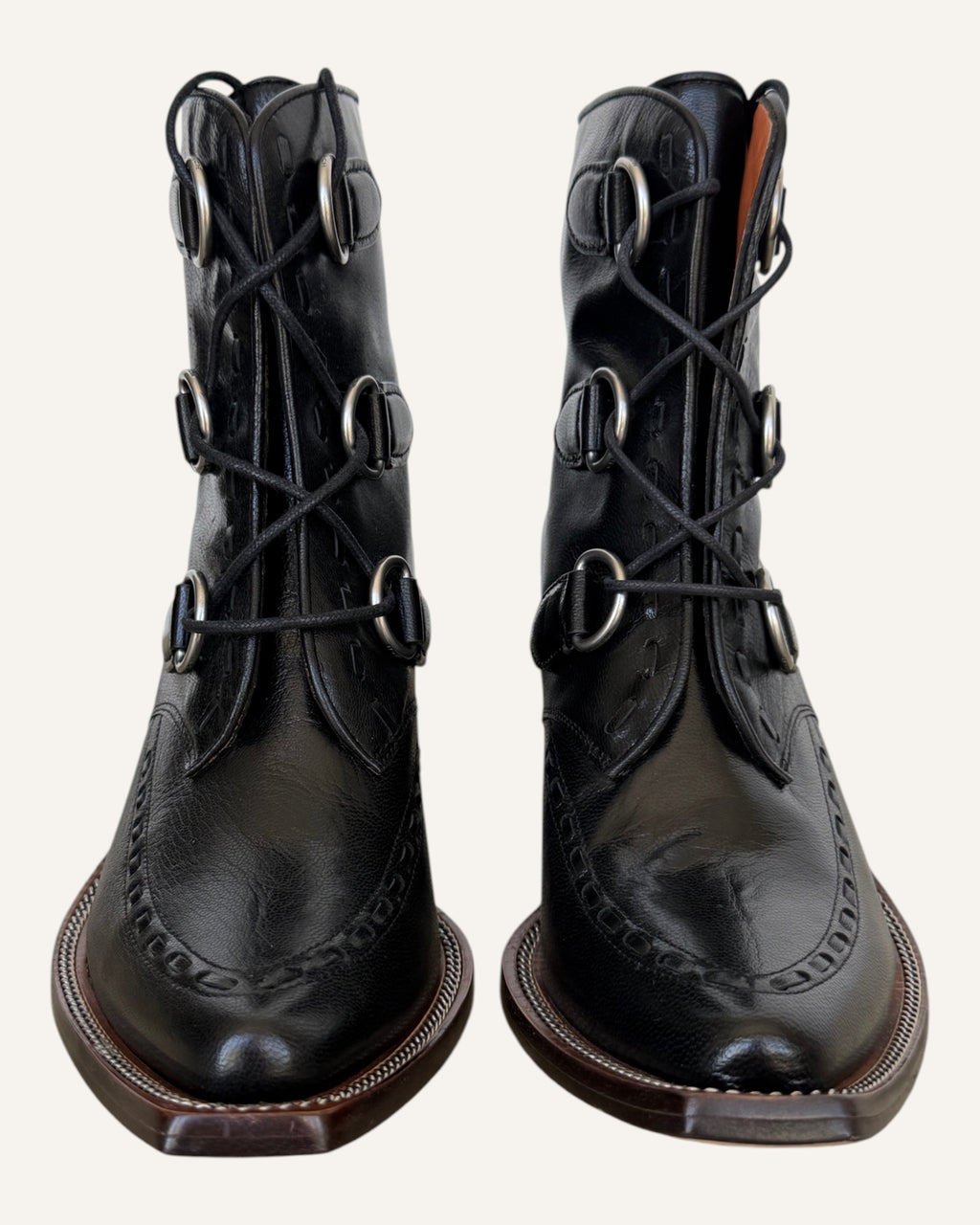 Coach black leather D-ring lace-up Western ankle boots with elongated toe and stacked heel, size 8.5