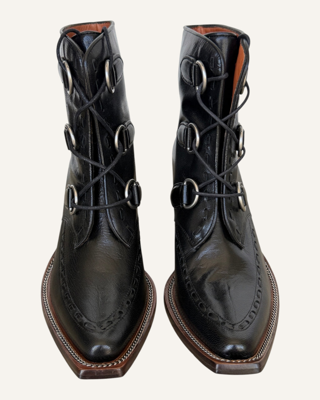 Coach black leather D-ring lace-up Western ankle boots with elongated toe and stacked heel, size 8.5