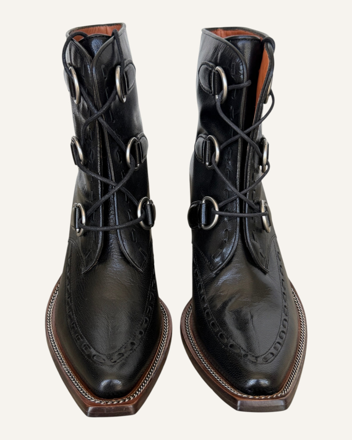 Coach black leather D-ring lace-up Western ankle boots with elongated toe and stacked heel, size 8.5