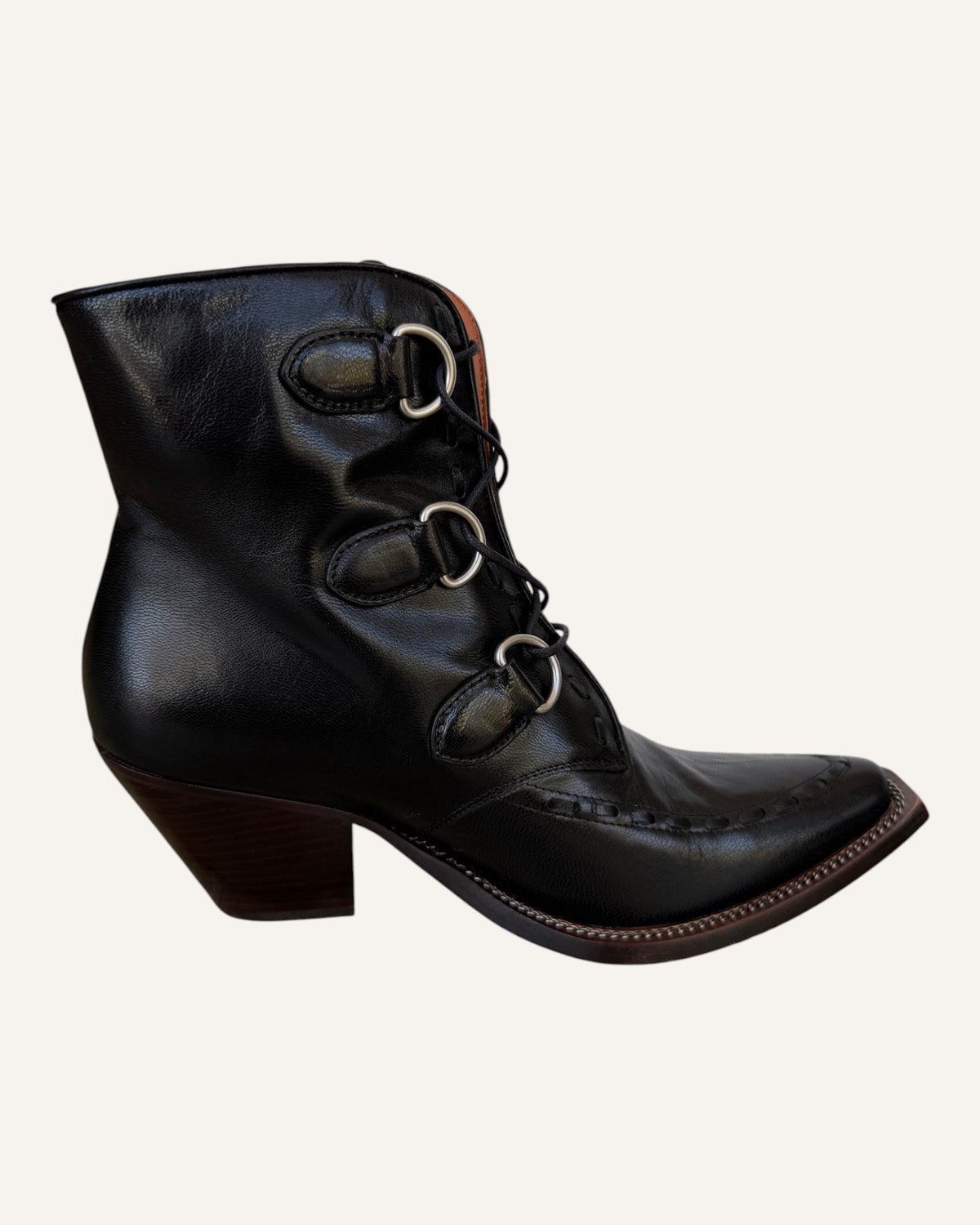 Coach black leather D-ring lace-up Western ankle boots with elongated toe and stacked heel, size 8.5